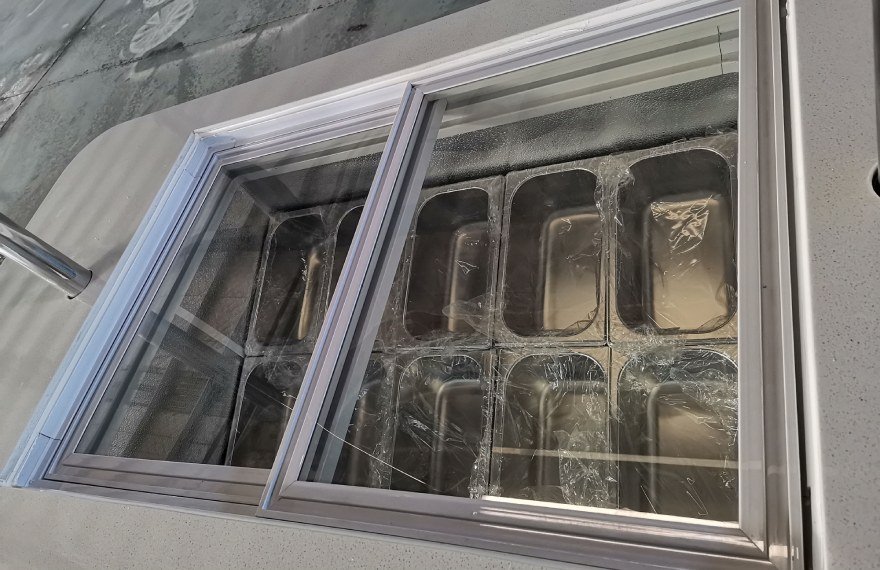 gelato freezer in the italian ice cream cart