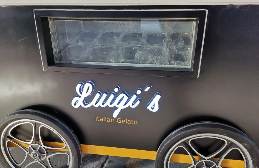 gelato display freezer in the italian ice cream cart